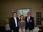 Ron Melbourne, Linda Silveira and Orren Robbins at the Rotary table